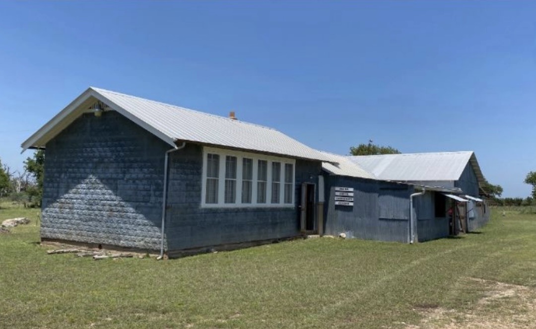 front and left side view of pecan creek school